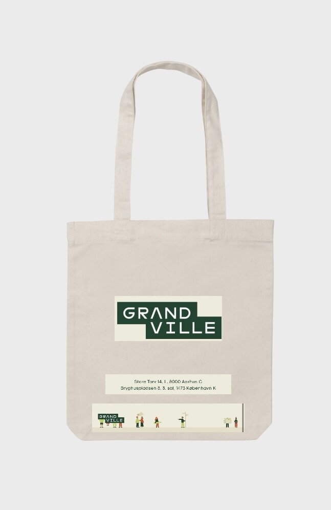 En lys mulepose med firmanavnet Grandvill